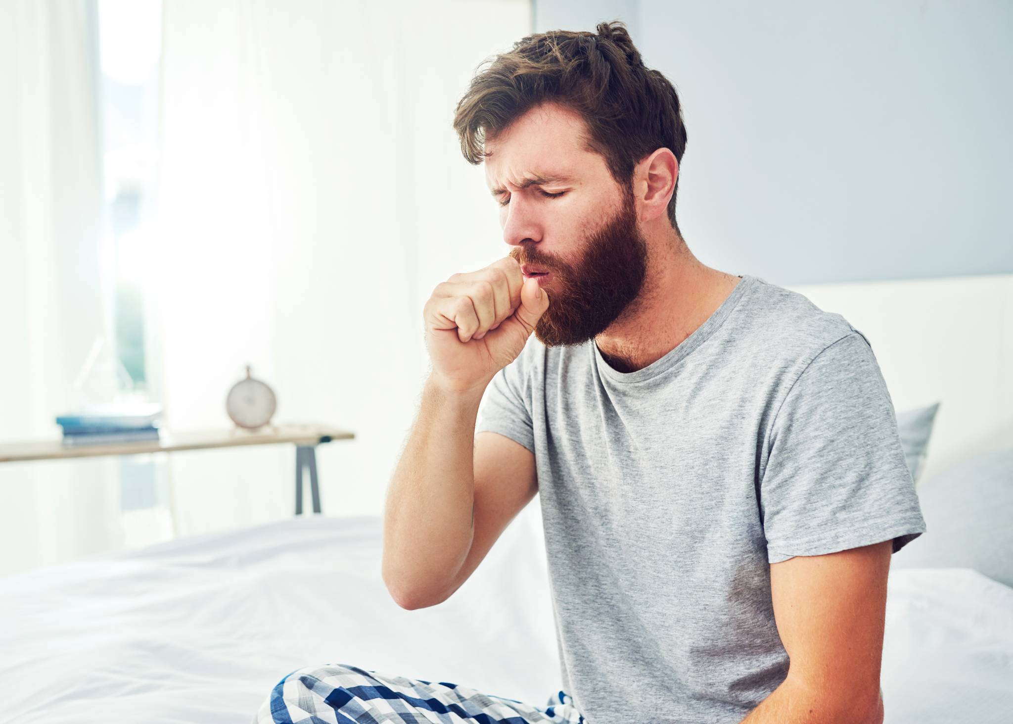 What causes a dry cough?